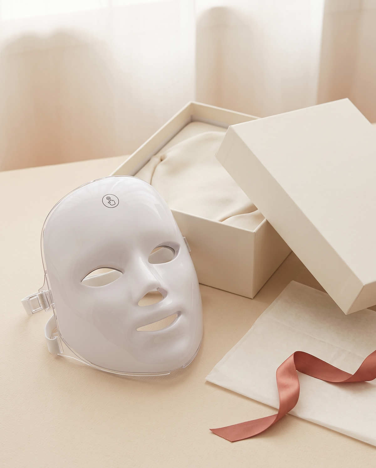 Maschera LED Glowmia con la sua confezione